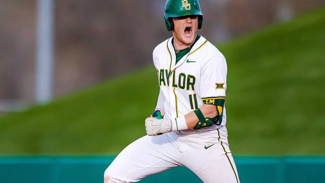 Baylor first baseman Tyce Armstrong celebrates after grand slam knock. via Baylor Athletics.
