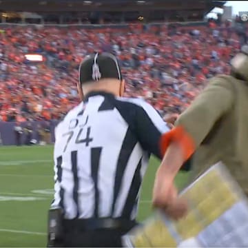 Broncos coach Sean Payton was flagged for unsportsmanlike conduct after a collision with down judge Derick Bowers.
