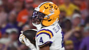 LSU Tigers cornerback Mansoor Delane (4) intercepts the pass of Clemson Tigers quarterback Cade Klubnik (2) Saturday, Aug. 30, 2025 during the NCAA football game at Memorial Stadium in Clemson, South Carolina. LSU Tigers won 17-10.