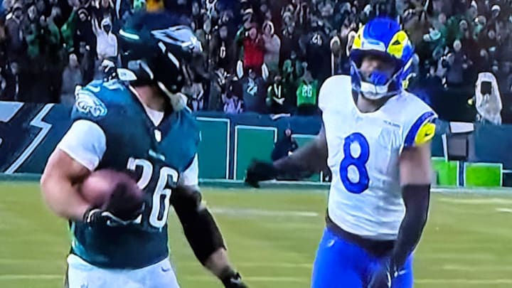 Barkley looking back at Verse at the end of his 62-yard touchdown run. 