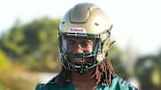 Jayden Petit prepares for a football drill during practice. The St. John Neumann High School football team held practice Tuesday morning July 29, 2025.