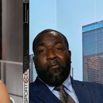 Elle Duncan and Kendrick Perkins react to a pun.