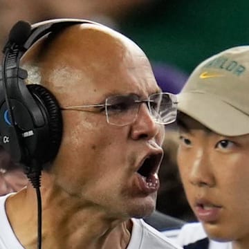 Sep 14, 2024; Waco, Texas, USA; Baylor Bears head coach Dave Aranda speaks with his team during a break in play against the Air Force Falcons during the second half at McLane Stadium. Mandatory Credit: Chris Jones-Imagn Images