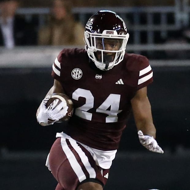 Mississippi State Bulldogs running back Keyvone Lee runs the ball  during the first half against the Mississippi Rebels.