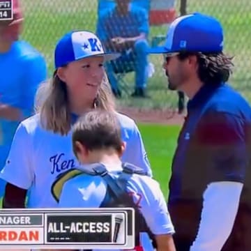 Kentucky coach Jake Riordan speaks to his team during a mound visit at the Little League World Series.