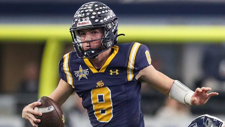 Highland Park sophomore quarterback Buck Randall evades tackle during the Class 5A, Division I state championship game on Saturday, Dec. 21, 2024, at AT&T Stadium in Arlington, Texas. Randall is one of the top returning junior quarterbacks in the state for the 2025 season.