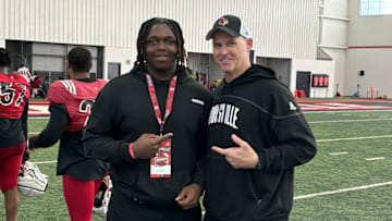 Radcliff (Ky.) North Hardin defensive tackle Josiah Hope and Louisville defensive line coach Mark Hagen