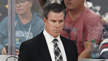 Pittsburgh Penguins coach Mike Sullivan looks on at the ice during a game.