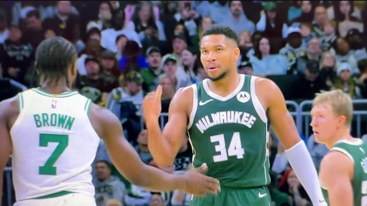 Giannis Antetokounmpo runs down court during the Milwaukee Bucks' game against the Boston Celtics. 