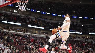Giannis Sparks Controversy with Late Dunk in Win