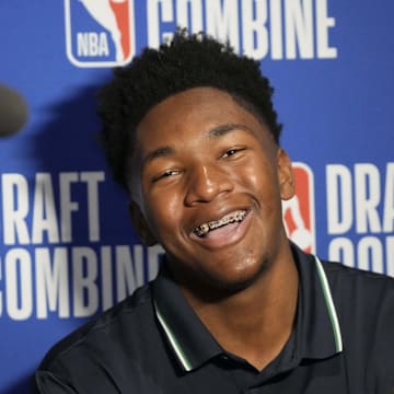 Derik Queen talks to reporters at the NBA draft combine in Chicago.