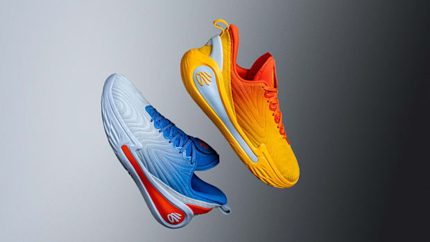 Blue and orange Curry Brand basketball shoes.