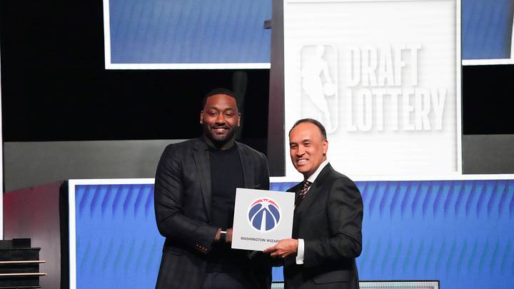 May 10, 2026; Chicago, IL, USA; Mark Tatum the NBA Deputy Commissioner and Washington Wizard (left) guard John Wall pose for photos after Wizards won the 2026 NBA Draft Lottery at Navy Pier. Mandatory Credit: David Banks-Imagn Images