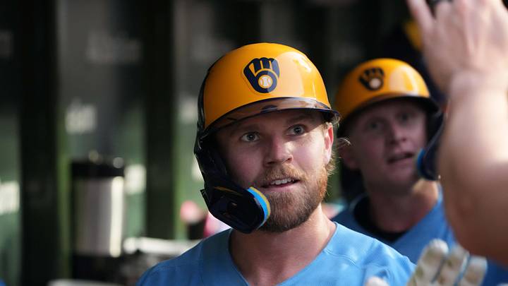 May 18, 2026; Chicago, Illinois, USA; Milwaukee Brewers left fielder Jake Bauers (9) is greeted in the dugout after hitting a three-run home run against the Chicago Cubs during the fifth inning at Wrigley Field. Mandatory Credit: David Banks-Imagn Images