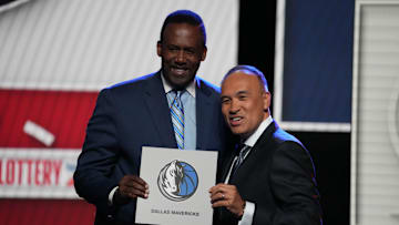 May 12, 2025; Chicago, Illinois, US; Rolando Blackman of the Dallas Mavericks poses with Mark Tatum NBA Deputy Commissioner after winning the the first pick during the 2025 NBA Draft Lottery at McCormick Place. Mandatory Credit: David Banks-Imagn Images