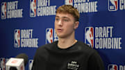 Cooper Flagg talks to the media during the 2025 NBA Draft Combine at Marriott Marquis Chicago.