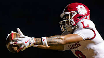 Orange Lutheran's Nico Bland put Orange Lutheran in front for good with a 67-yard fourth quarter touchdown catch, helping the Lancers pull off their huge playoff upset of St. John Bosco.