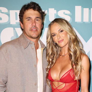 Brooks Koepka and Jena Sims attend Sports Illustrated Swimsuit Runway Show in Miami Beach, Florida in May 2025.