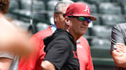 Arkansas Razorbacks coach Dave Van Horn visiting with national media at practice for the Super Regional against the Tennessee Volunteers at Baum-Walker Stadium in Fayetteville, Ark.