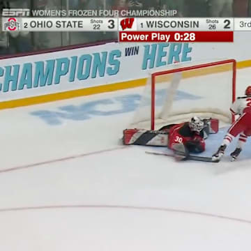 Wisconsin's Kristen Simms beats Ohio State's Amanda Thiele with a game-tying penalty shot in the Frozen Four championship game. 