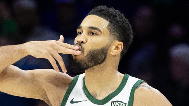Nov 15, 2023; Philadelphia, Pennsylvania, USA; Boston Celtics forward Jayson Tatum (0) reacts after his three point score against the Philadelphia 76ers during the fourth quarter at Wells Fargo Center. Mandatory Credit: Bill Streicher-Imagn Images