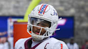 Sep 20, 2025; Blacksburg, Virginia, USA;  Virginia Tech Hokies quarterback Kyron Drones (1) after a touchdown run during the fourth quarter against the Wofford Terriers at Lane Stadium. Mandatory Credit: Brian Bishop-Imagn Images