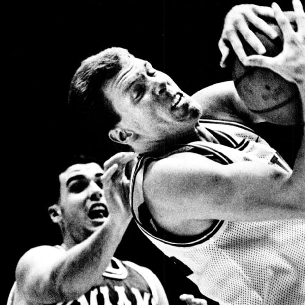 Indiana's Eric Anderson snares a rebound in a Nov. 29, 1989 game against Miami of Ohio.