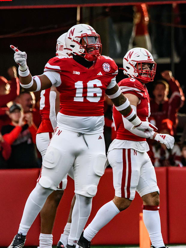 Elijah Jeudy (16) celebrates an incomplete pass from Wisconsin quarterback, Braedyn Locke. 