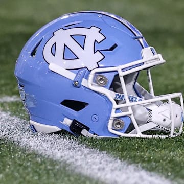 Oct 28, 2023; Atlanta, Georgia, USA; A detailed view of a North Carolina Tar Heels helmet on the field before a game against the Georgia Tech Yellow Jackets at Bobby Dodd Stadium at Hyundai Field. Mandatory Credit: Brett Davis-Imagn Images