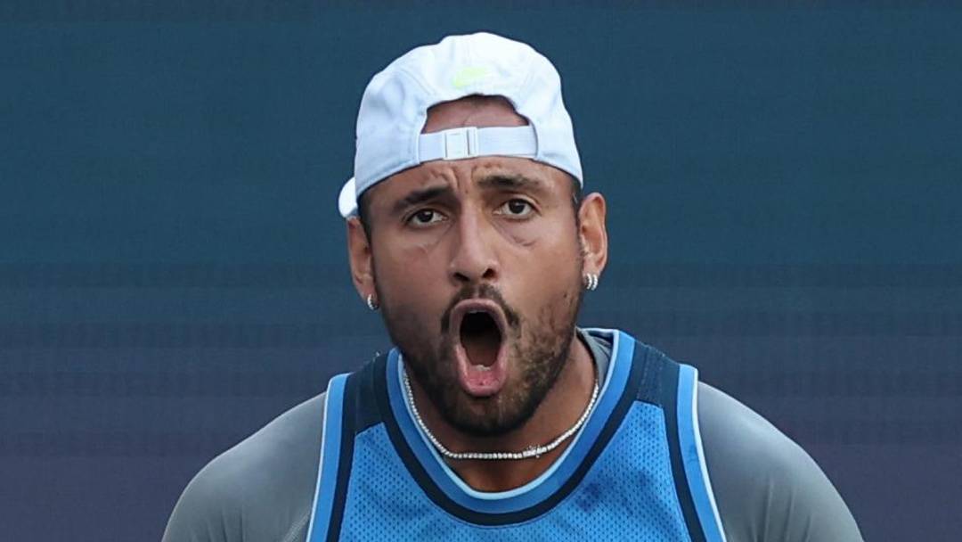 Nick Kyrgios reacts after winning a point Nick Kyrgios reacts after winning a point