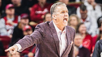 John Calipari points from the sideline against Ole Miss in Arkansas' SEC home opener. Ole Miss won 73-66.