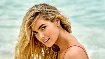 Kate Upton was photographed by Yu Tsai in Mexico. Swimsuit by Versace.