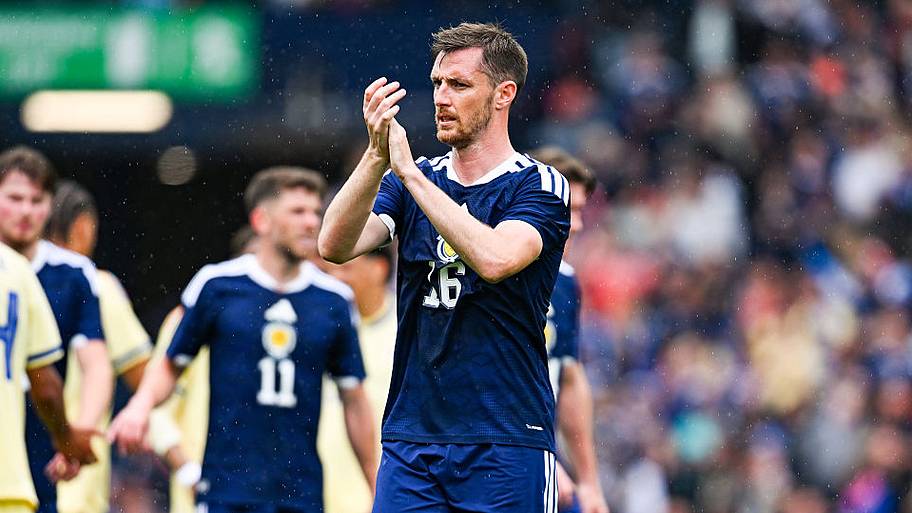 Dom Hyam applauds fans at full time during an International Friendly match between Scotland and Curacao.