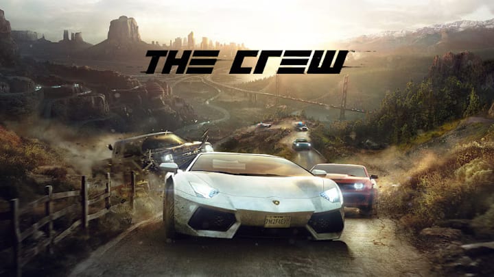A bunch of different cars racing towards the camera.