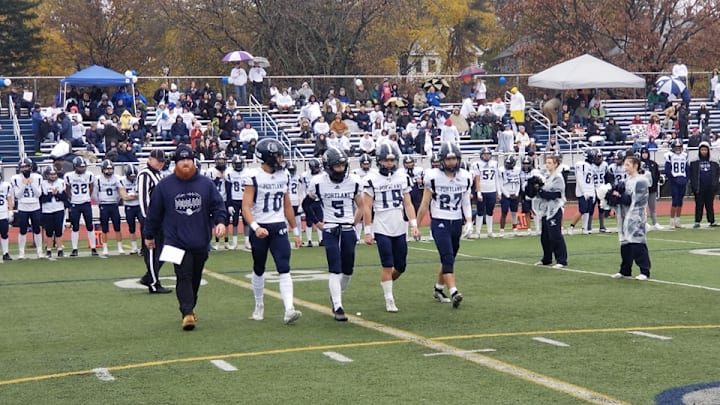 Portland Bulldogs walking up at the 2023 Maine high school football state championships. 