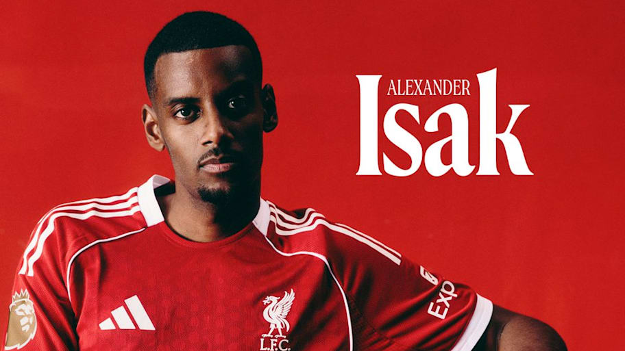 Alexander Isak posing in Liverpool kit.