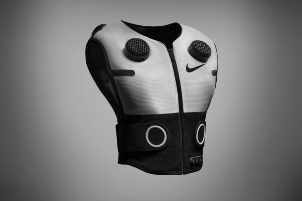 Grey and black Nike vest.
