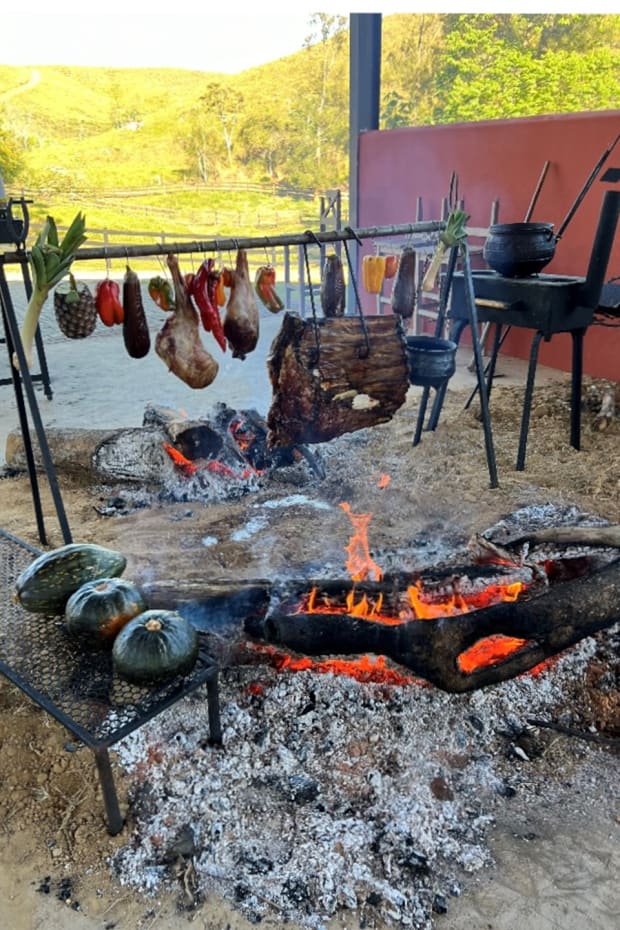 Food cooking over an open fire.
