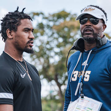 Chicago Bears wide receiver Maurice Alexander Jr. and head coach Willie Simmons