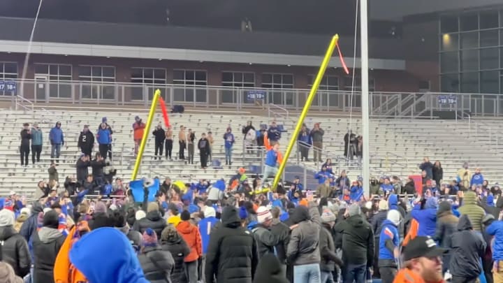 Boise State students tear down goal posts after beating UNLV in the Mountain West championship.