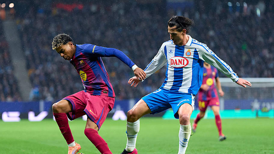 Lamine Yamal and Carlos Romero. 