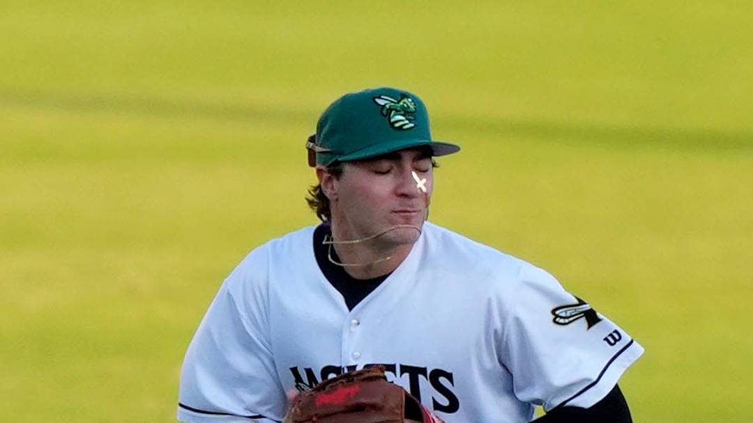 Augusta GreenJacket infielder Alex Lodise (12) looks to pass during opening day of the Augusta GreenJackets at SRP Park in North Augusta, S.C., on Tuesday, April 14, 2026. The GreenJackets beat Fayetteville 4-2. Mandatory Credit: Katie Goodale - Augusta Chronicle/USA TODAY NETWORK