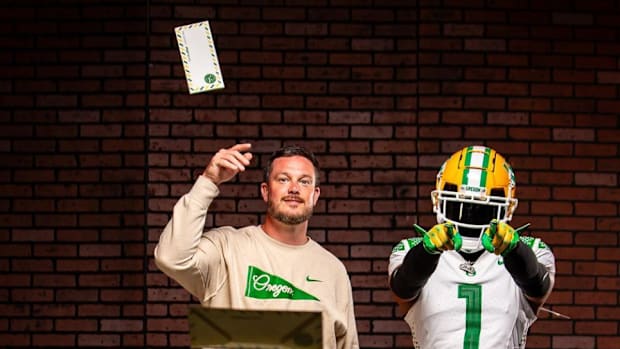 Na’eem Offord and Oregon Ducks coach Dan Lanning
