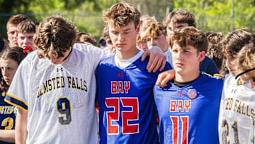 Lacrosse players around Ohio gather to celebrate Dylan Veselic