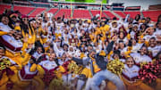 West Charlotte's football players, coaches and cheerleaders celebrate winning the NCHSAA Class 3A state title on Dec. 21, 2024 in Raleigh. The Lions beat Seventy-First, 14-7.
