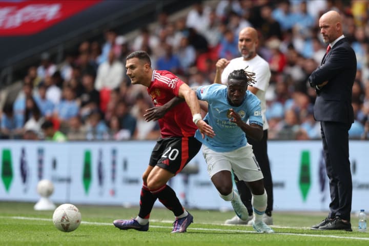 Diogo Dalot, Jeremy Doku, Erik ten Hag, Pep Guardiola