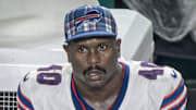 Buffalo Bills linebacker Von Miller watches from the sidelines during the team's 31-10 win over the Miami Dolphins on Thursday night. 