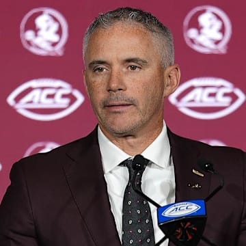 Jul 23, 2025; Charlotte, NC, USA; Florida State head coach Mike Norvell answers questions from the media during ACC Media days at Hilton Charlotte Uptown. Mandatory Credit: Jim Dedmon-Imagn Images