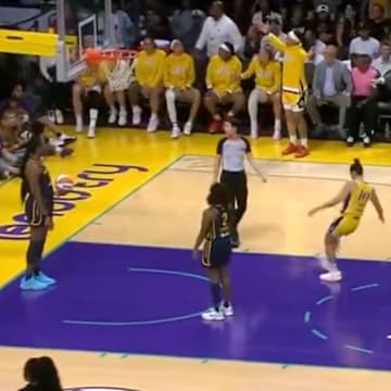 Sparks star Kelsey Plum kicks an object off the court during Tuesday night's game. 