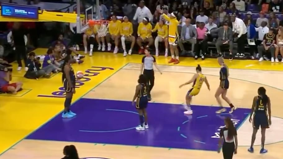 Sparks star Kelsey Plum kicks an object off the court during Tuesday night's game.  | WNBA